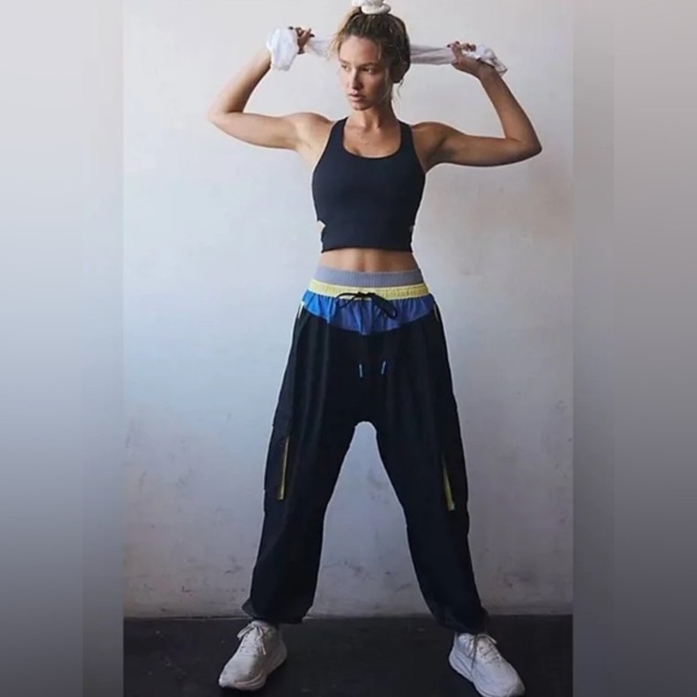 FP Movement by Free People Black Track Joggers with Blue and Yellow Accents